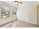 Bedroom with tile floors and ceiling fan at 4512 70Th N St, St Petersburg, FL 33709