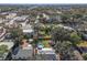 Aerial view of the property, showing a fenced backyard and above ground swimming pool at 4951 86Th N Ave, Pinellas Park, FL 33782