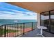 Spacious balcony overlooking the water with table and chairs at 6145 Sun Blvd # 607, St Petersburg, FL 33715