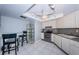 Kitchen with stainless steel appliances and breakfast nook at 6145 Sun Blvd # 607, St Petersburg, FL 33715