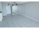 Bright living room features neutral walls and tile flooring, offering a clean, modern aesthetic at 6145 Sun Blvd # 607, St Petersburg, FL 33715