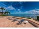 Relaxing patio area with lounge chairs overlooking the bay at 6145 Sun Blvd # 607, St Petersburg, FL 33715