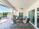 Relaxing patio area with seating and a view of the water at 6510 Seabird Way, Apollo Beach, FL 33572