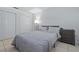 Bedroom with double bed, closet, and dresser at 8209 Rugby Ct, Hudson, FL 34667