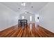 Spacious dining area with hardwood floors and breakfast bar at 8209 Rugby Ct, Hudson, FL 34667