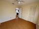 Bedroom with wood floors and access to kitchen at 822 Gulf Blvd # 4-6, Indian Rocks Beach, FL 33785
