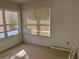 Simple bedroom with two windows and neutral walls at 822 Gulf Blvd # 4-6, Indian Rocks Beach, FL 33785