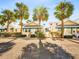 Quaint beach cottage with white picket fence and lush landscaping at 822 Gulf Blvd # 4-6, Indian Rocks Beach, FL 33785