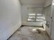 Sunroom with white walls and access to a patio at 822 Gulf Blvd # 4-6, Indian Rocks Beach, FL 33785
