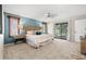 Spacious main bedroom with sliding doors to the pool at 8614 Maidstone Ct, Seminole, FL 33777