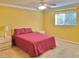 Bedroom with a double bed and ceiling fan at 9336 Villa Entrada, New Port Richey, FL 34655