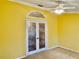 Bedroom with sliding glass doors and neutral decor at 9336 Villa Entrada, New Port Richey, FL 34655