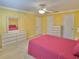 Main bedroom with a dresser and a queen-size bed at 9336 Villa Entrada, New Port Richey, FL 34655