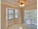 Bright dining area with bay window and access to the patio at 9336 Villa Entrada, New Port Richey, FL 34655