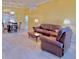 Open living room and dining area with a spacious layout at 9336 Villa Entrada, New Port Richey, FL 34655