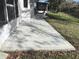 Spacious patio with a unique compass-star design at 9336 Villa Entrada, New Port Richey, FL 34655