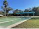 Enjoy a game of shuffleboard under the covered shelter at 9336 Villa Entrada, New Port Richey, FL 34655