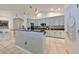 Modern kitchen featuring an island and ample cabinet space at 9415 Sayre St, Riverview, FL 33569