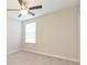 Bright bedroom with ceiling fan and neutral decor at 10147 Newminster Loop, Ruskin, FL 33573