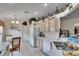 Modern kitchen with white cabinetry and dual sinks at 10516 Goldwater Ln, Riverview, FL 33578