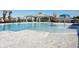 Resort-style pool with a water feature and shaded seating at 18292 Hunters Meadow Walk, Land O Lakes, FL 34638