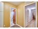 Hallway with doors to bathroom and other rooms at 1901 N Highland Ave, Clearwater, FL 33755