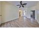 Light and airy entryway with wood-look tile floors at 2561 Regal River Rd, Valrico, FL 33596