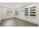 Bright office space featuring herringbone floors and floating shelves at 2710 1St S Ave, St Petersburg, FL 33712