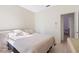 Bedroom featuring tile flooring, closet and a window at 3203 Audubon Ct, Tarpon Springs, FL 34688