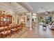 Formal dining room with hardwood floors, chandelier, and large table at 5006 Tari Stream Way, Brandon, FL 33511