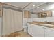Bathroom with white vanity, toilet and shower/tub combo at 512 Acacia Ln, Nokomis, FL 34275