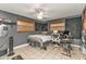 Bedroom with a bed, desk, and soundproof panels at 512 Acacia Ln, Nokomis, FL 34275