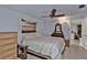 Bright bedroom with king-size bed and view of kitchen at 512 Acacia Ln, Nokomis, FL 34275
