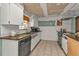 Kitchen with granite countertops, stainless steel appliances and sink at 512 Acacia Ln, Nokomis, FL 34275