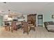 Eat-in kitchen with granite countertops and a center island at 512 Acacia Ln, Nokomis, FL 34275