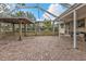 Spacious brick paved patio with covered area at 512 Acacia Ln, Nokomis, FL 34275