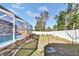 Backyard with pool, spa, and fenced yard at 5156 Mentmore Ave, Spring Hill, FL 34606