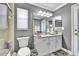 Clean bathroom with granite countertop and walk-in shower at 5156 Mentmore Ave, Spring Hill, FL 34606