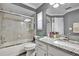 Bathroom with granite countertop, tub, and shower at 5156 Mentmore Ave, Spring Hill, FL 34606