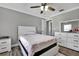 Bedroom with a twin bed, dresser and ceiling fan at 5156 Mentmore Ave, Spring Hill, FL 34606