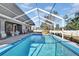 Inviting screened pool with spacious deck at 5156 Mentmore Ave, Spring Hill, FL 34606