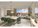 Elegant dining area with water views and modern decor at 5701 Bowen Daniel Dr. # 402, Tampa, FL 33616