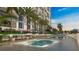 Resort-style pool and spa with comfortable seating at 5701 Bowen Daniel Dr. # 402, Tampa, FL 33616