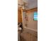 Bathroom with bathtub and shower, showing damage and needs renovation at 6404 Pershing Ne St, St Petersburg, FL 33702