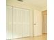 Spacious bedroom with built-in closet and tile flooring at 6741 Willits Ave, New Port Richey, FL 34655
