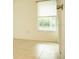 Small bedroom with window and closet at 6741 Willits Ave, New Port Richey, FL 34655
