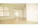 Bright bedroom with mirrored closet and tile floors at 6741 Willits Ave, New Port Richey, FL 34655