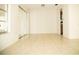Bright dining room with tile floor and mirrored closet at 6741 Willits Ave, New Port Richey, FL 34655