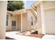 Front entrance of the home with walkway and landscaping at 6741 Willits Ave, New Port Richey, FL 34655