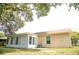 Single story house with Florida room and yard at 6741 Willits Ave, New Port Richey, FL 34655
